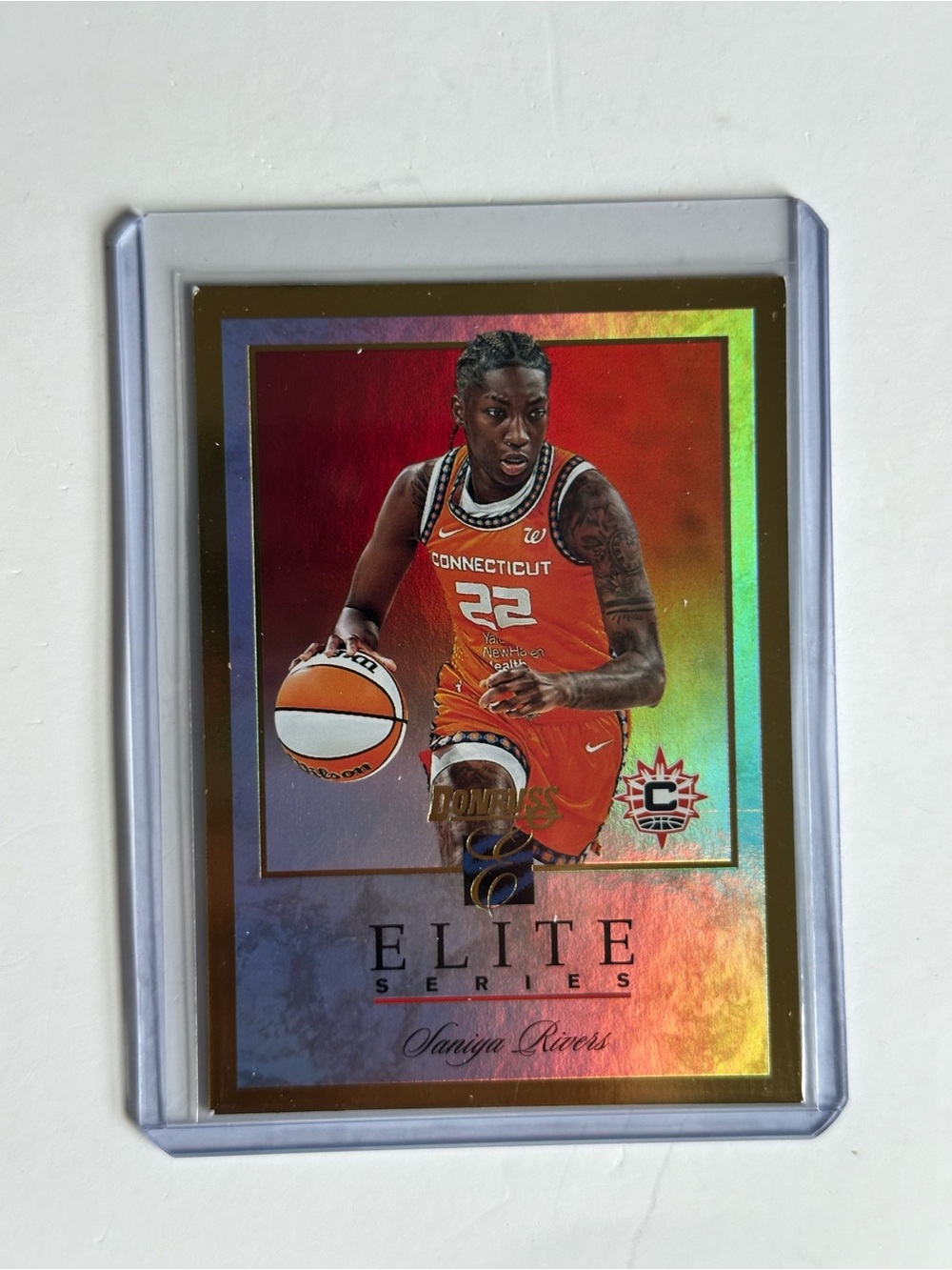 Panini Elite Series Saniya Rivers - Orange Holo